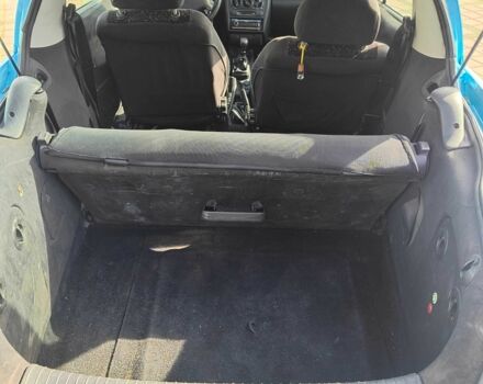 Синий Опель Тигра, объемом двигателя 1.4 л и пробегом 269 тыс. км за 2999 $, фото 5 на Automoto.ua