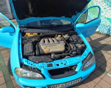 Синий Опель Тигра, объемом двигателя 1.4 л и пробегом 269 тыс. км за 2999 $, фото 10 на Automoto.ua