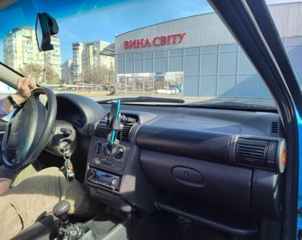 Синий Опель Тигра, объемом двигателя 1.4 л и пробегом 269 тыс. км за 2999 $, фото 15 на Automoto.ua