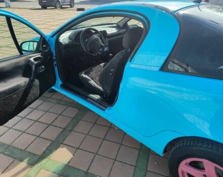 Синий Опель Тигра, объемом двигателя 1.4 л и пробегом 269 тыс. км за 2999 $, фото 6 на Automoto.ua