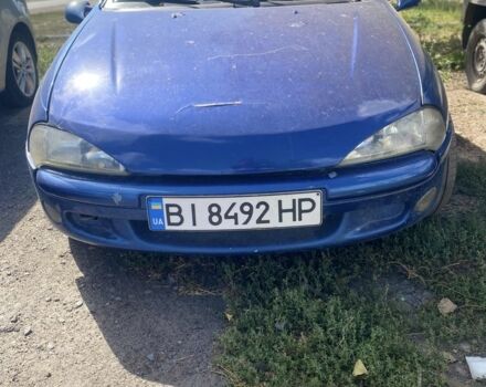 Синий Опель Тигра, объемом двигателя 1.4 л и пробегом 3 тыс. км за 1900 $, фото 1 на Automoto.ua