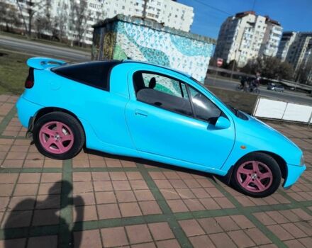 Синий Опель Тигра, объемом двигателя 1.4 л и пробегом 269 тыс. км за 2999 $, фото 3 на Automoto.ua