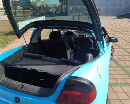 Синий Опель Тигра, объемом двигателя 1.4 л и пробегом 269 тыс. км за 2999 $, фото 4 на Automoto.ua