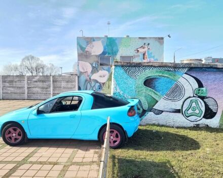 Синий Опель Тигра, объемом двигателя 1.4 л и пробегом 269 тыс. км за 2999 $, фото 11 на Automoto.ua