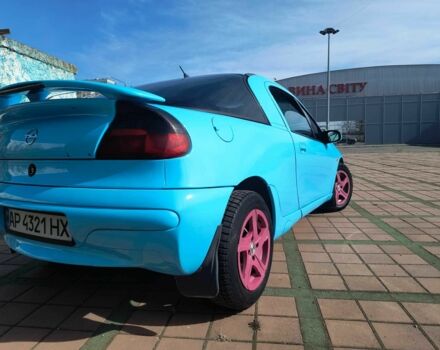 Синий Опель Тигра, объемом двигателя 1.4 л и пробегом 269 тыс. км за 2999 $, фото 1 на Automoto.ua