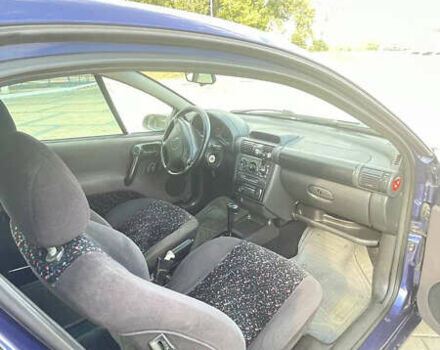 Синій Опель Тігра, об'ємом двигуна 1.4 л та пробігом 242 тис. км за 3800 $, фото 3 на Automoto.ua