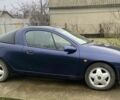 Синій Опель Тігра, об'ємом двигуна 1.4 л та пробігом 205 тис. км за 2200 $, фото 1 на Automoto.ua