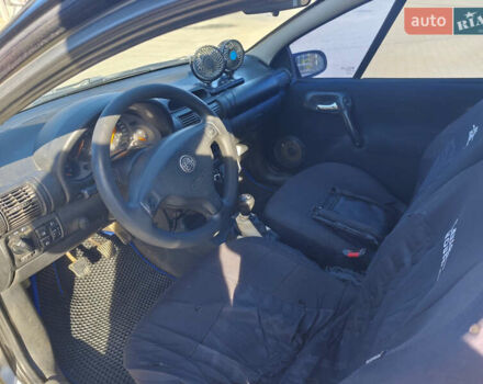 Синій Опель Тігра, об'ємом двигуна 1.4 л та пробігом 295 тис. км за 2500 $, фото 5 на Automoto.ua