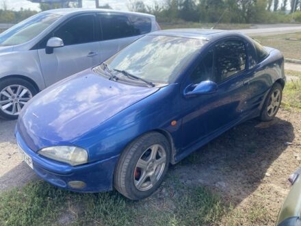 Синий Опель Тигра, объемом двигателя 1.4 л и пробегом 3 тыс. км за 1900 $, фото 1 на Automoto.ua