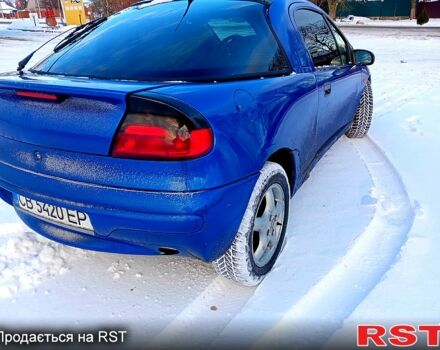 Синий Опель Тигра, объемом двигателя 1.6 л и пробегом 350 тыс. км за 1600 $, фото 1 на Automoto.ua