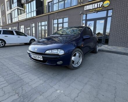 Синий Опель Тигра, объемом двигателя 1.6 л и пробегом 249 тыс. км за 2099 $, фото 1 на Automoto.ua