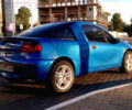 Синий Опель Тигра, объемом двигателя 1.4 л и пробегом 137 тыс. км за 3700 $, фото 1 на Automoto.ua