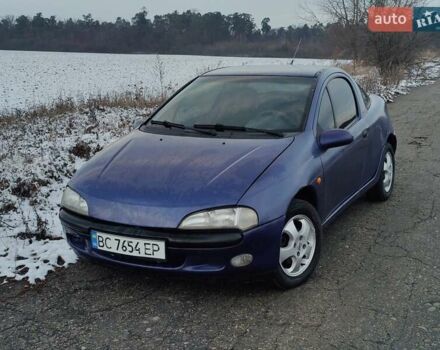 Синий Опель Тигра, объемом двигателя 1.39 л и пробегом 223 тыс. км за 2199 $, фото 1 на Automoto.ua