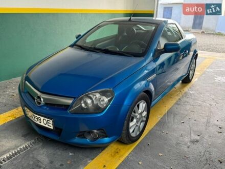 Синий Опель Тигра, объемом двигателя 1.39 л и пробегом 200 тыс. км за 4450 $, фото 1 на Automoto.ua