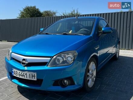 Синий Опель Тигра, объемом двигателя 1.4 л и пробегом 219 тыс. км за 3500 $, фото 1 на Automoto.ua