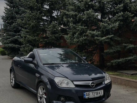 Синий Опель Тигра, объемом двигателя 1.3 л и пробегом 236 тыс. км за 4100 $, фото 1 на Automoto.ua