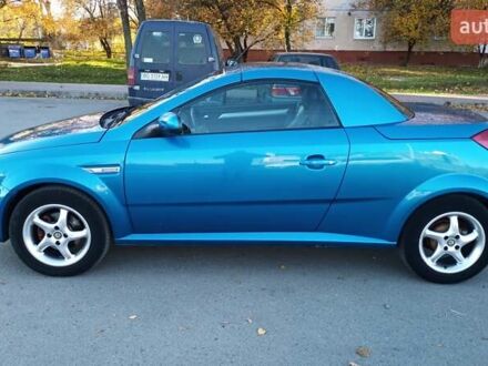 Синий Опель Тигра, объемом двигателя 1.3 л и пробегом 215 тыс. км за 5700 $, фото 1 на Automoto.ua