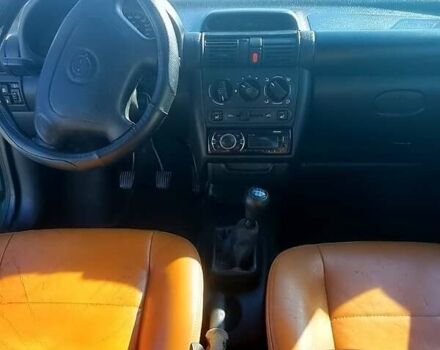 Зелений Опель Тігра, об'ємом двигуна 1.4 л та пробігом 220 тис. км за 2700 $, фото 10 на Automoto.ua