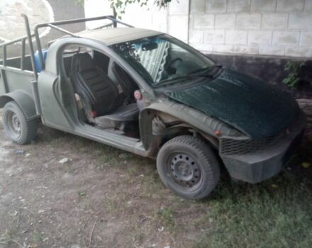 Зелений Опель Тігра, об'ємом двигуна 0 л та пробігом 250 тис. км за 1699 $, фото 1 на Automoto.ua