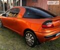 Оранжевый Опель Тигра, объемом двигателя 1.39 л и пробегом 210 тыс. км за 3500 $, фото 4 на Automoto.ua