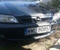 Черный Опель Вектра Б, объемом двигателя 1.8 л и пробегом 313 тыс. км за 1550 $, фото 1 на Automoto.ua