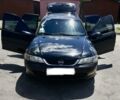 Черный Опель Вектра Б, объемом двигателя 2 л и пробегом 300 тыс. км за 2100 $, фото 2 на Automoto.ua