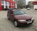 Красный Опель Вектра Б, объемом двигателя 2 л и пробегом 280 тыс. км за 4300 $, фото 1 на Automoto.ua