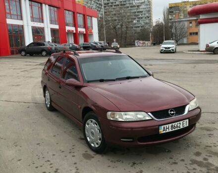 Красный Опель Вектра Б, объемом двигателя 2 л и пробегом 280 тыс. км за 4300 $, фото 1 на Automoto.ua