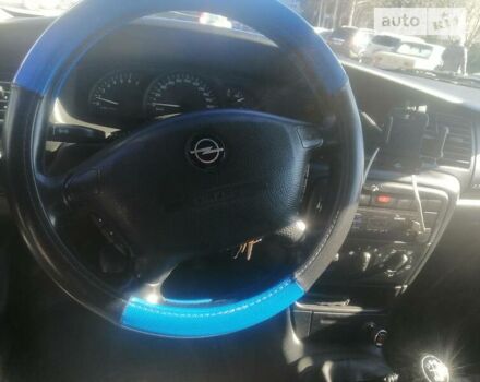 Синий Опель Вектра Б, объемом двигателя 1.6 л и пробегом 208 тыс. км за 3000 $, фото 2 на Automoto.ua