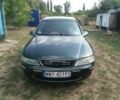 Зеленый Опель Вектра Б, объемом двигателя 2 л и пробегом 255 тыс. км за 1500 $, фото 1 на Automoto.ua