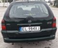 Зеленый Опель Вектра Б, объемом двигателя 2 л и пробегом 270 тыс. км за 1750 $, фото 1 на Automoto.ua