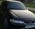 Чорний Опель Вектра, об'ємом двигуна 2 л та пробігом 320 тис. км за 2400 $, фото 1 на Automoto.ua