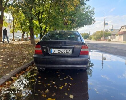 Черный Опель Вектра, объемом двигателя 2.5 л и пробегом 380 тыс. км за 3100 $, фото 1 на Automoto.ua