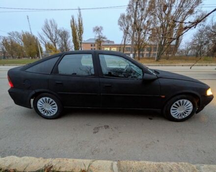 Чорний Опель Вектра, об'ємом двигуна 2 л та пробігом 301 тис. км за 1349 $, фото 1 на Automoto.ua