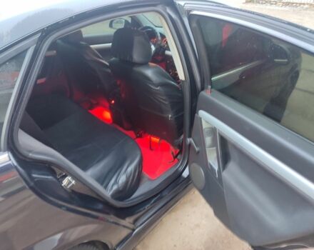 Черный Опель Вектра, объемом двигателя 2.2 л и пробегом 351 тыс. км за 3950 $, фото 6 на Automoto.ua