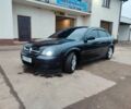 Черный Опель Вектра, объемом двигателя 2.2 л и пробегом 351 тыс. км за 3950 $, фото 1 на Automoto.ua