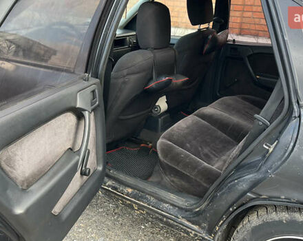 Черный Опель Вектра, объемом двигателя 1.8 л и пробегом 374 тыс. км за 1300 $, фото 7 на Automoto.ua