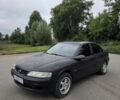 Черный Опель Вектра, объемом двигателя 2 л и пробегом 400 тыс. км за 1248 $, фото 1 на Automoto.ua