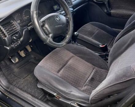 Чорний Опель Вектра, об'ємом двигуна 1.7 л та пробігом 430 тис. км за 1000 $, фото 8 на Automoto.ua