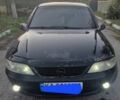 Чорний Опель Вектра, об'ємом двигуна 2 л та пробігом 270 тис. км за 2309 $, фото 1 на Automoto.ua