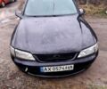 Черный Опель Вектра, объемом двигателя 1.8 л и пробегом 200 тыс. км за 1000 $, фото 1 на Automoto.ua