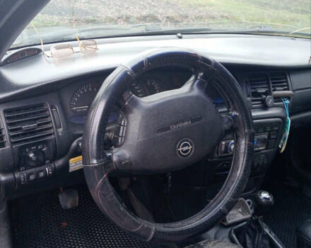 Черный Опель Вектра, объемом двигателя 1.8 л и пробегом 454 тыс. км за 1750 $, фото 4 на Automoto.ua