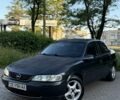Черный Опель Вектра, объемом двигателя 1.6 л и пробегом 300 тыс. км за 1250 $, фото 1 на Automoto.ua