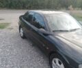 Черный Опель Вектра, объемом двигателя 1.6 л и пробегом 259 тыс. км за 2500 $, фото 4 на Automoto.ua