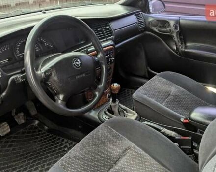 Черный Опель Вектра, объемом двигателя 1.8 л и пробегом 402 тыс. км за 2300 $, фото 12 на Automoto.ua