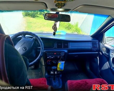 Черный Опель Вектра, объемом двигателя 16 л и пробегом 250 тыс. км за 3000 $, фото 2 на Automoto.ua
