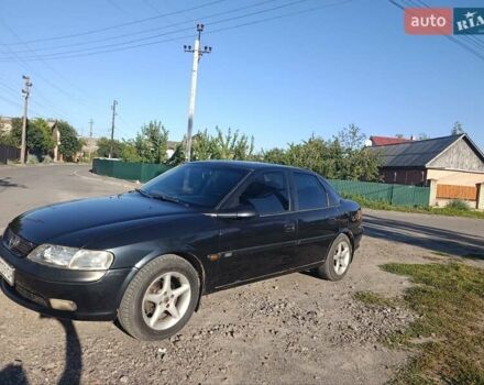 Черный Опель Вектра, объемом двигателя 1.6 л и пробегом 271 тыс. км за 2450 $, фото 5 на Automoto.ua