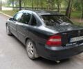 Черный Опель Вектра, объемом двигателя 1.6 л и пробегом 396 тыс. км за 2300 $, фото 2 на Automoto.ua