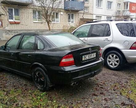Черный Опель Вектра, объемом двигателя 1.6 л и пробегом 300 тыс. км за 2050 $, фото 5 на Automoto.ua