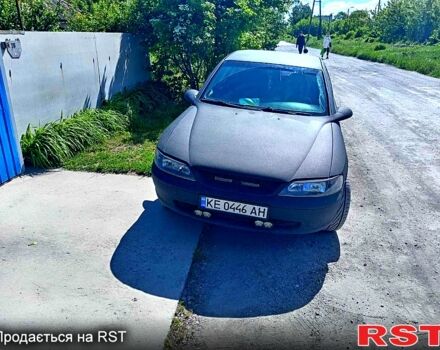 Черный Опель Вектра, объемом двигателя 16 л и пробегом 250 тыс. км за 3000 $, фото 1 на Automoto.ua